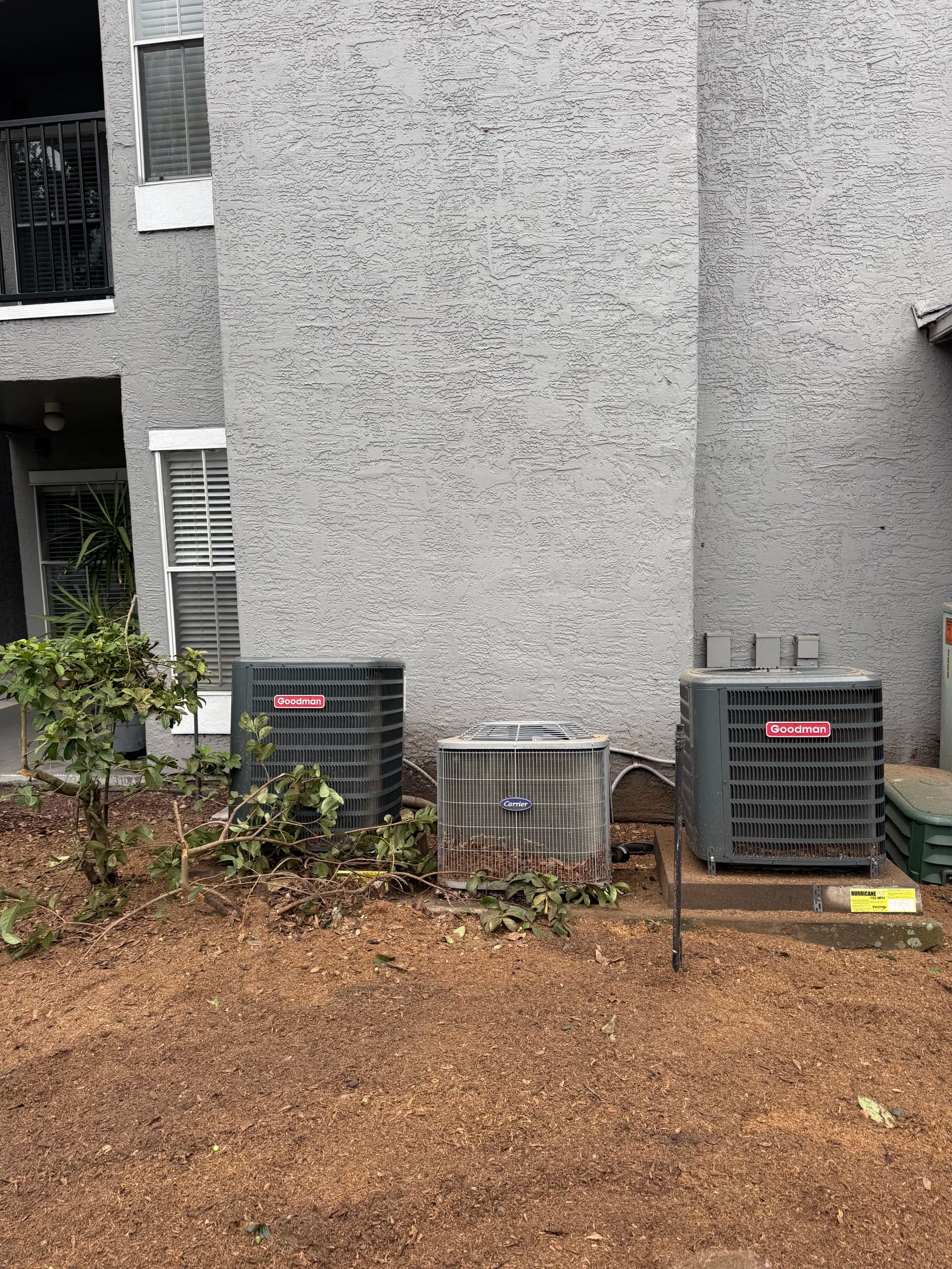 Gallery photos for Stump Removal Protecting AC Units at Maitland Summit Apartments: Image #1